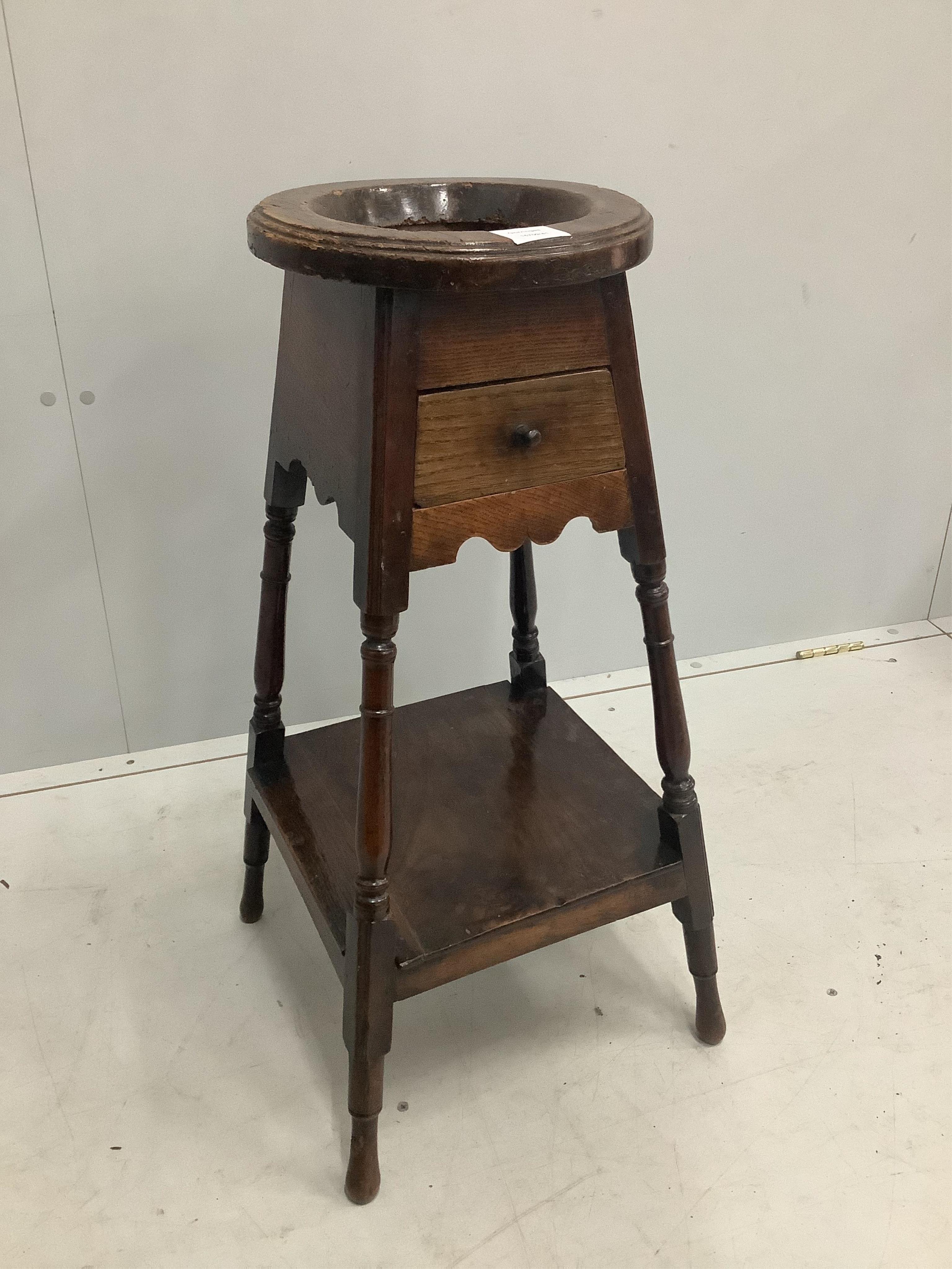 An early 18th century elm and walnut wig stand, height 74cm. Purchased from Mallett & Son of New Bond St., 15th March 1954 for £45. Condition - worming to the top and other wear, but overall fair